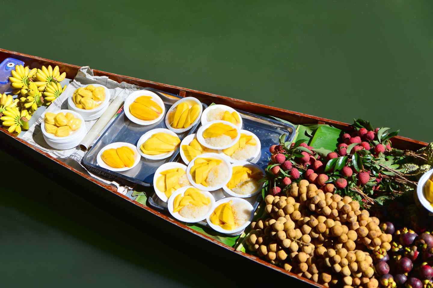 Vietnamese fruits are sold in small boat