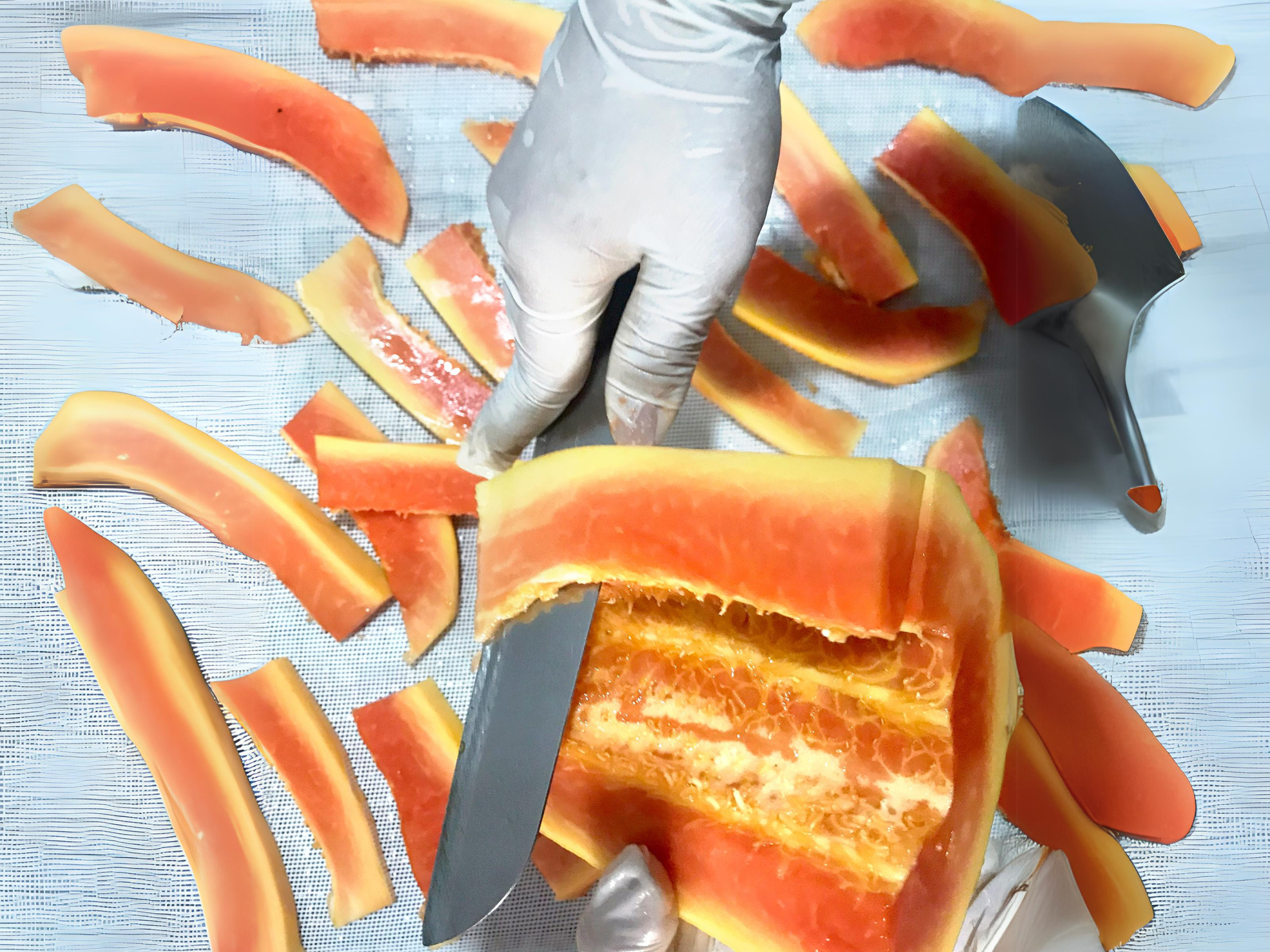 cutting papaya in cheerfarm, premium dreid fruits